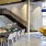 a spacious room with a staircase
