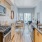a kitchen with a stove and oven