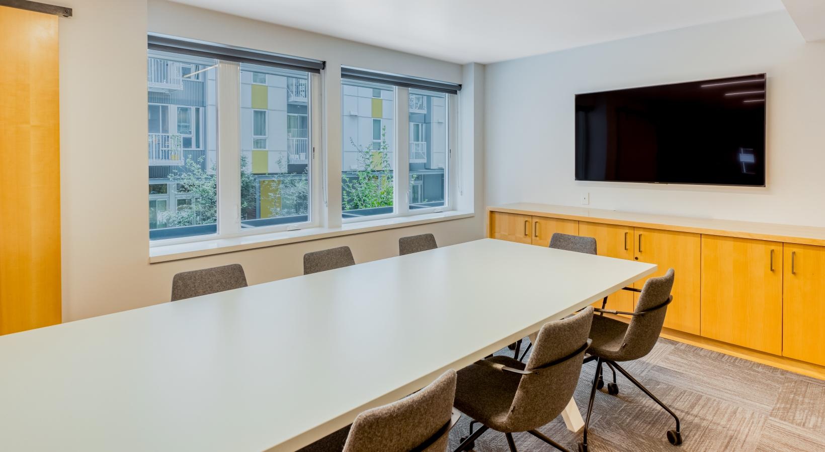 Settle into comfort at Arras a conference room with a large table