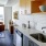 a kitchen with a sink and a table