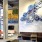 a room with a large painting on the wall