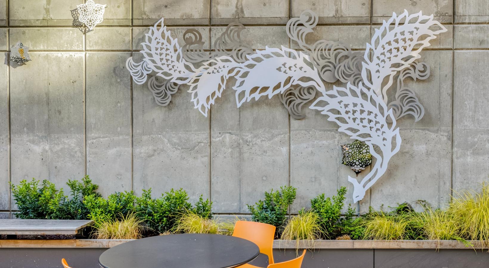 Everything within reach a table and chairs outside