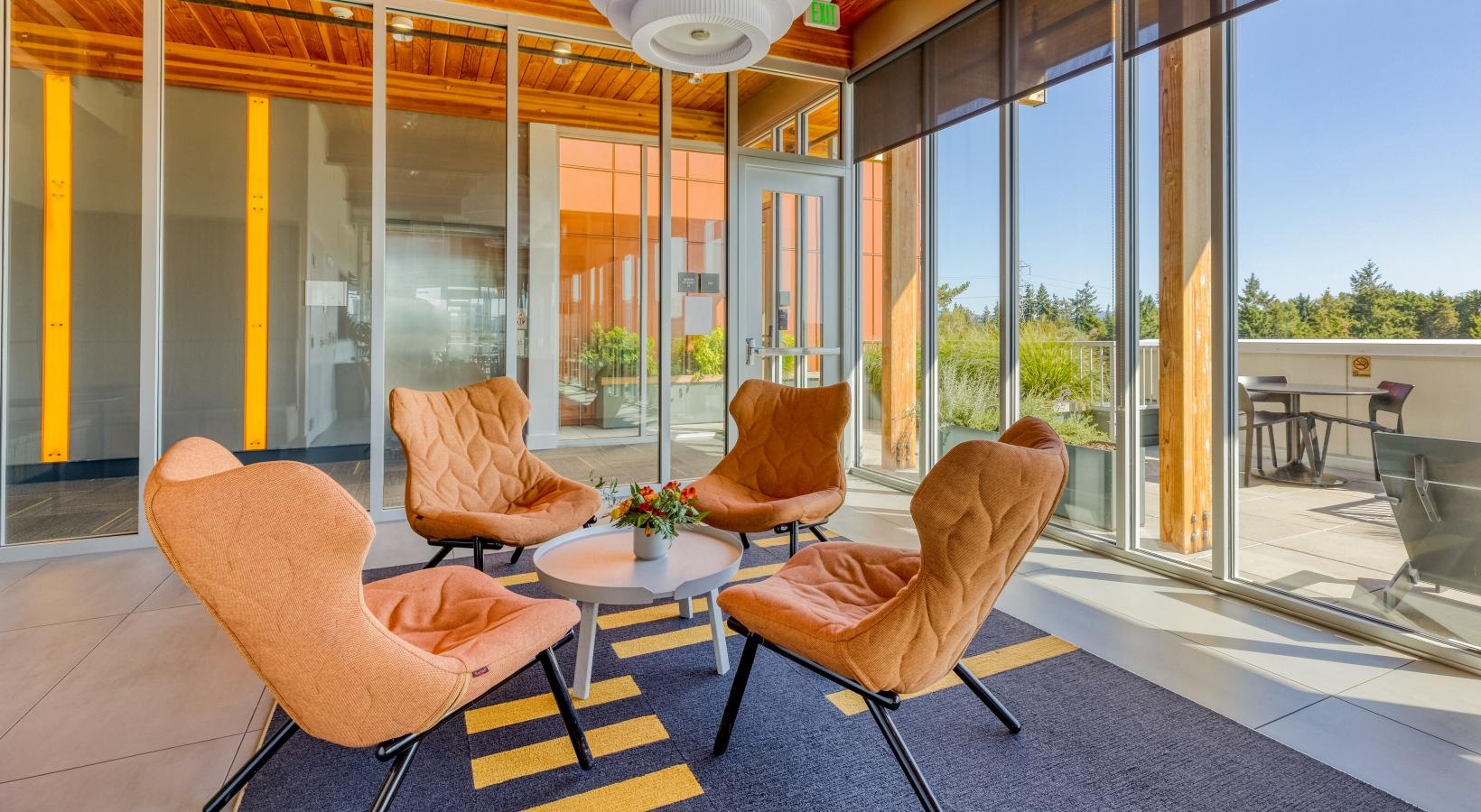 Enjoy our resident-only features a rooftop with chairs and a table