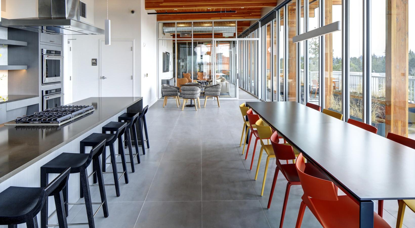Everything within reach a kitchen with tables and chairs