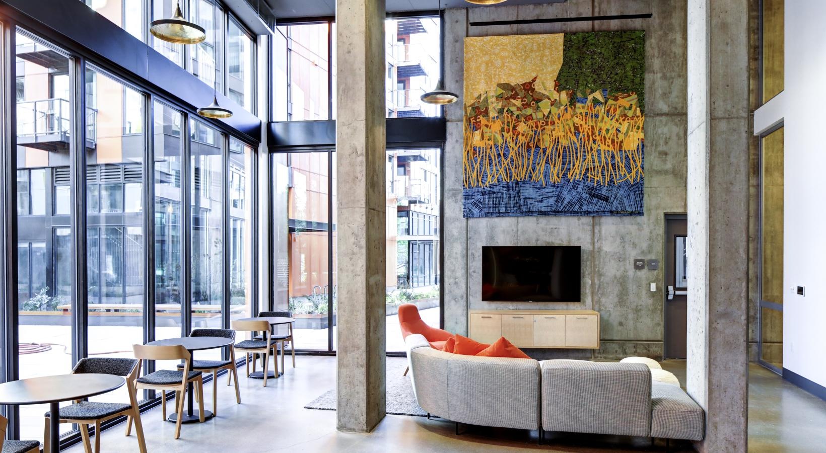 Everything within reach a room with a tv and a couch