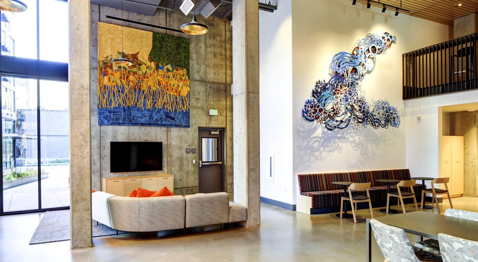 Enjoy our resident-only features a room with a media area and a couch
